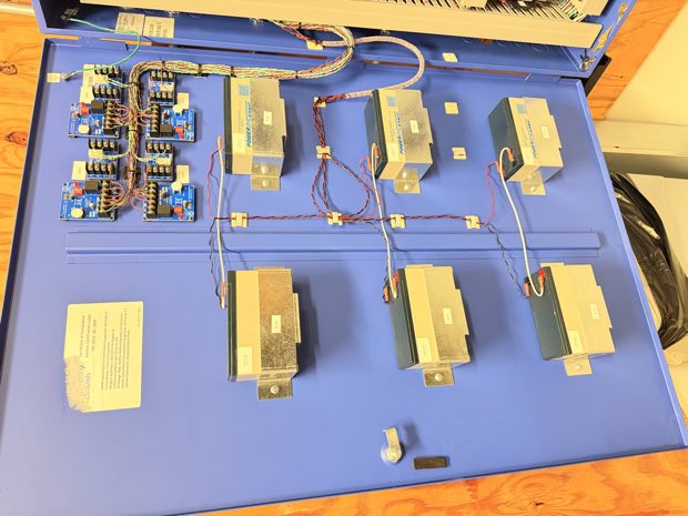 Access control backplane with door controllers and power