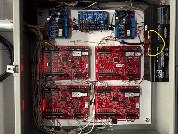 Multi-board access control panel wired and labeled