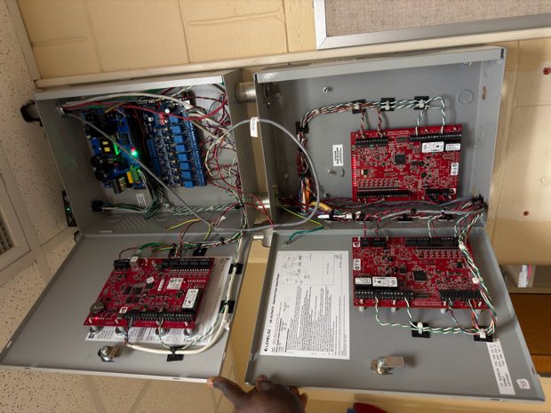 Access control enclosure with controller boards and power supplies