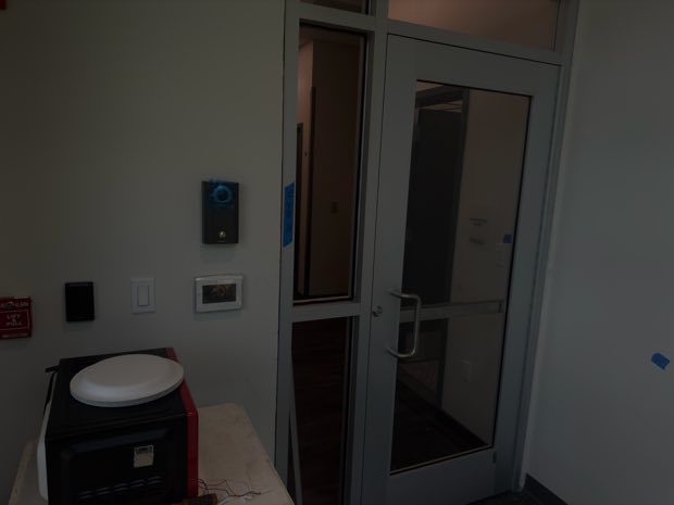 Controlled entry vestibule with reader and glass doors