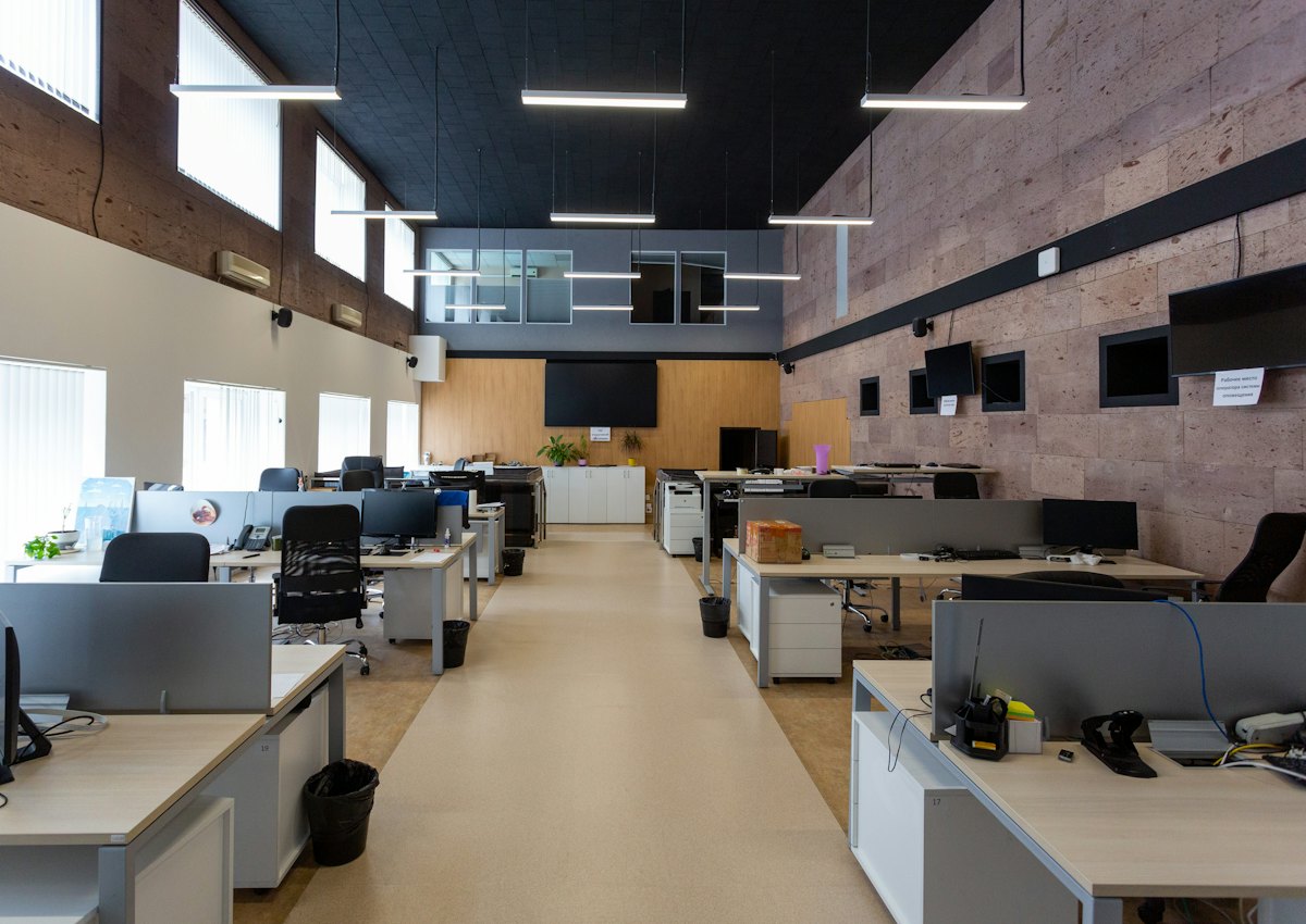 Open-plan commercial office served by structured cabling and wireless