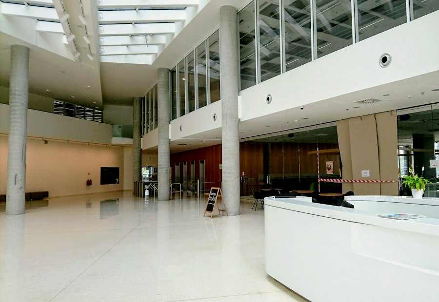 Clean white clinical corridor in a medical facility